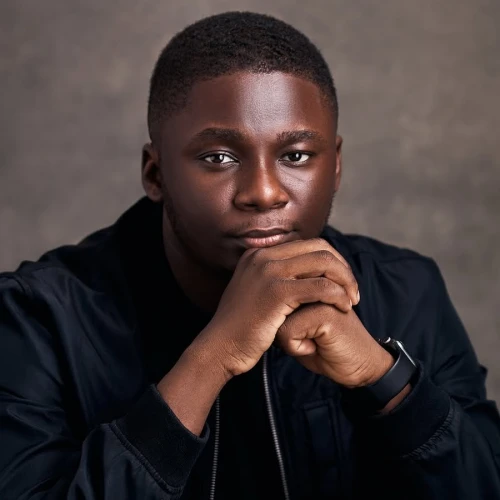 PAUL TOMISIN